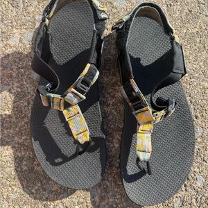 Bedrock sandals in patchwork pattern. Used one season. Women’s 9 Men’s 8.